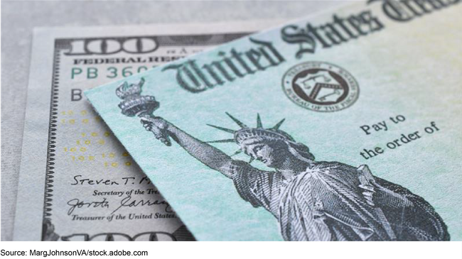 A United States Treasury check with a one-hundred-dollar bill. A United States Treasury check with a one-hundred-dollar bill.