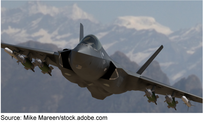 Military aircraft flying through the sky with mountains in the background. Military aircraft flying through the sky with mountains in the background.