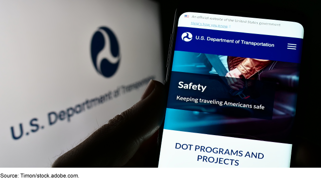Picture of a Department of Transportation webpage on a phone. Picture of a Department of Transportation webpage on a phone.