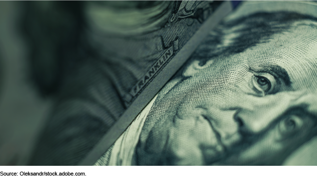 Close-up photo of a $100 bill focused on Benjamin Franklin's portrait. Close-up photo of a $100 bill focused on Benjamin Franklin's portrait.