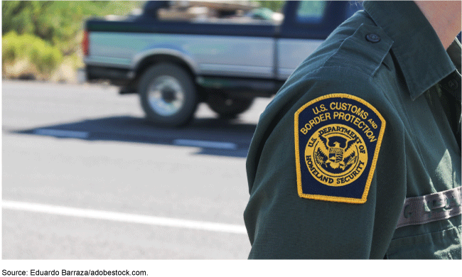 A Homeland Security Border Patrol agent's patch on their shoulder