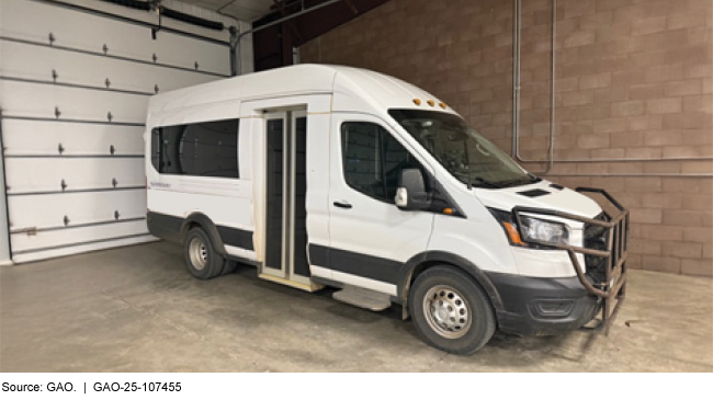 A large van with various accessibility features such as full-height entry doors.