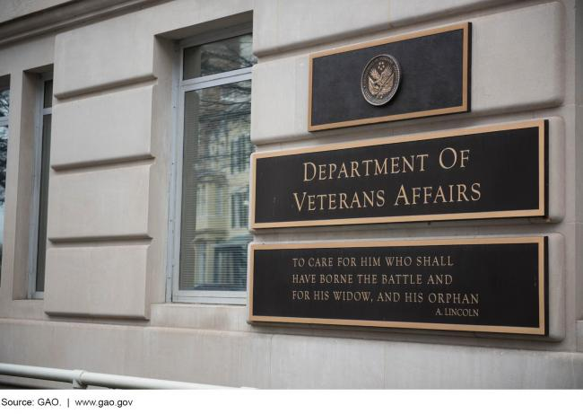 Exterior plaque at Department of Veterans Affairs headquarters building with department seal and mission statement