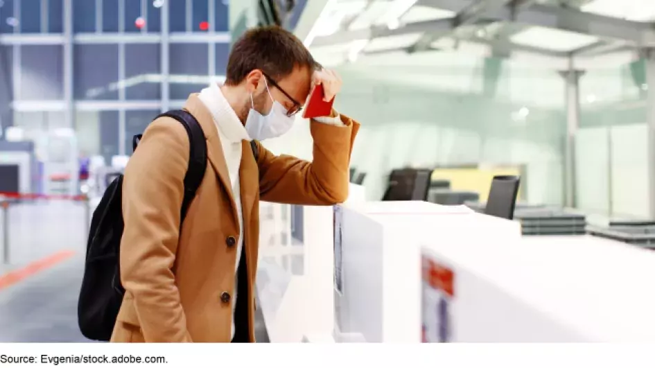 Airport check-in sad traveler