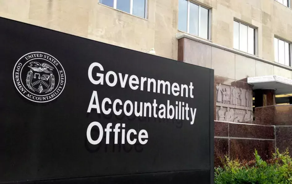 A photo of GAO headquarters in Washington DC. The sign in the photo reads "Government Accountability Office."