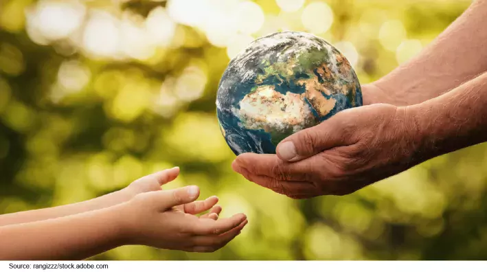 Illustration of an adult's hands cradling the Earth and and handing it down to a child's hands.