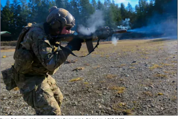 Photo of a special operations servicemember shooting a rifle