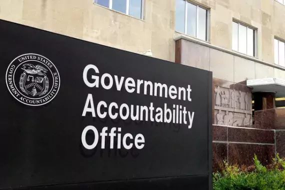 A photo of GAO headquarters in Washington DC. The sign in the photo reads &quot;Government Accountability Office.&quot;