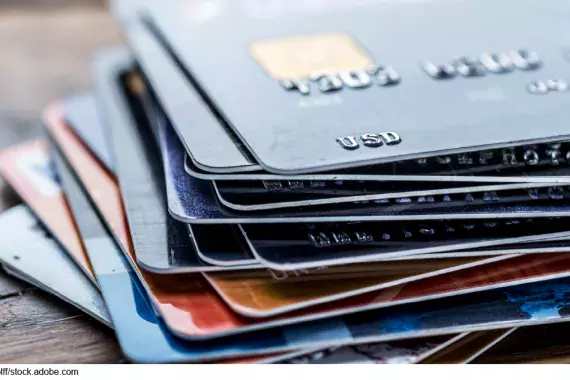 Stock image of a stack of credit cards.