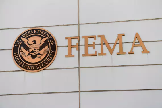 Photo of U.S. Department of Homeland Security and FEMA signs