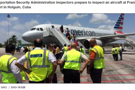 Photo showing Transportation Security Administration Inspectors preparing to inspect an aircraft at Frank Pais Airport in Holguin, Cuba